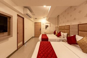 Habitación cuádruple Premium | Tabla de planchar con plancha y wifi gratis 