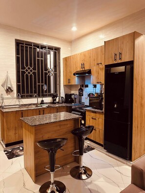 Shared Dormitory, 1 Bedroom, Balcony | Interior - Room-private En-suite,pool & In-room TV (Dar es Salaam)