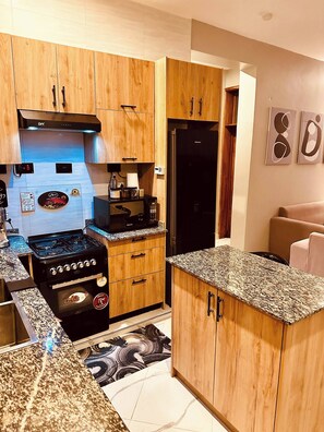 Shared Dormitory, 1 Bedroom, Balcony | Interior - Room-private En-suite,pool & In-room TV (Dar es Salaam)