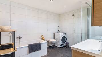 Shower, hair dryer, towels