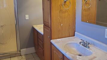 Shower, towels, soap, toilet paper