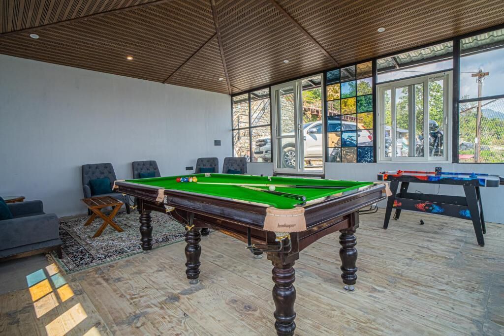Executive Villa, Balcony, Garden View | Games room