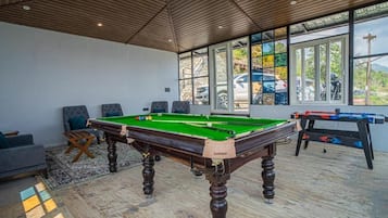 Executive Villa, Balcony, Garden View | Games room