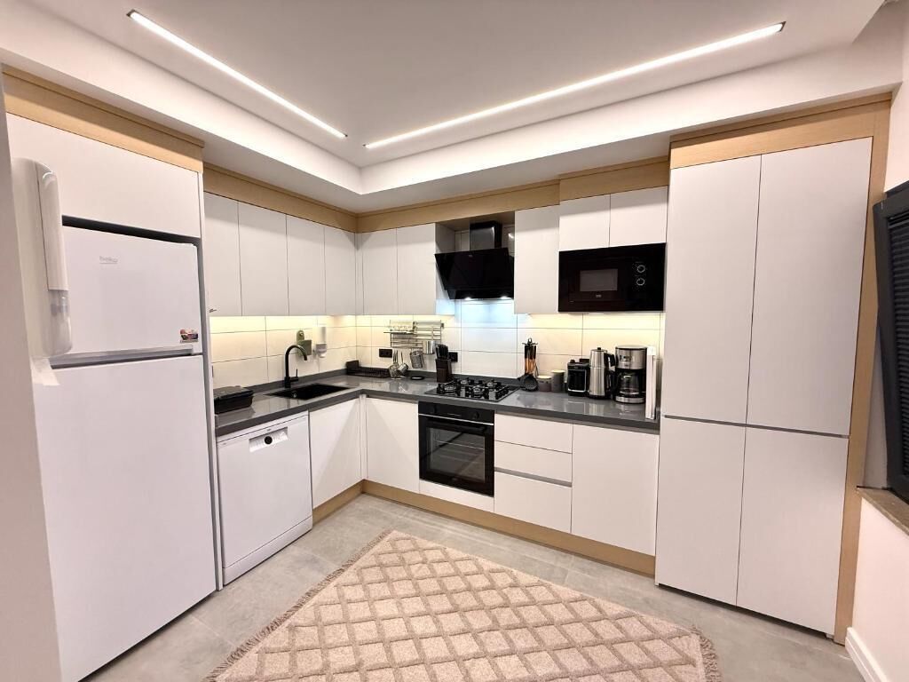 Family Suite, City View | Private kitchen | Coffee/tea maker, electric kettle, highchair