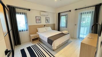 Familien-Suite, Stadtblick | Zimmersafe, Verdunkelungsvorhänge, Bügeleisen/Bügelbrett