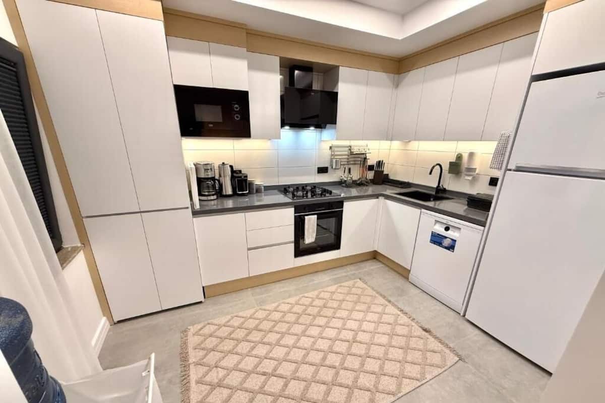 Family Suite, City View | Private kitchen