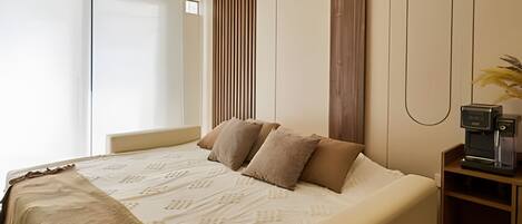 Appartement Deluxe | Rideaux dâobscurcissement, fer et planche Ă repasser