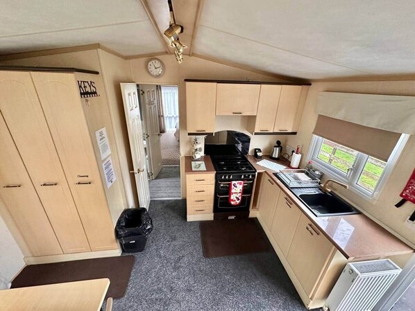 Fridge, microwave, oven, stovetop - 2 Bedroom BK Static Caravan in Uddingston, Glasgow (Uddingston)