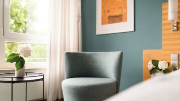 Hochwertige Bettwaren, Daunenbettdecken, Minibar, Zimmersafe