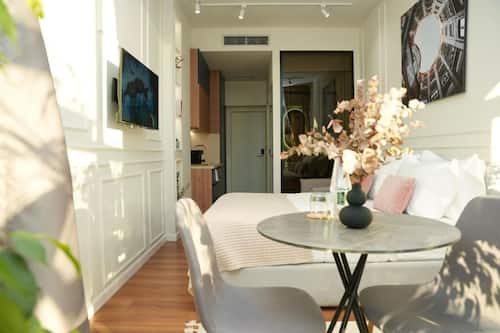 Suite Deluxe, vue ville | Restauration
