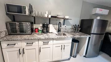 Microwave, coffee/tea maker, toaster, high chair