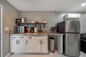 Microwave, coffee/tea maker, toaster, high chair