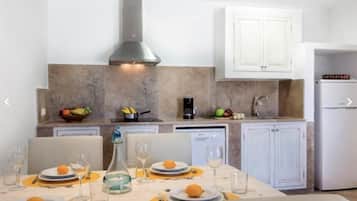 Fridge, microwave, stovetop, cookware/dishes/utensils