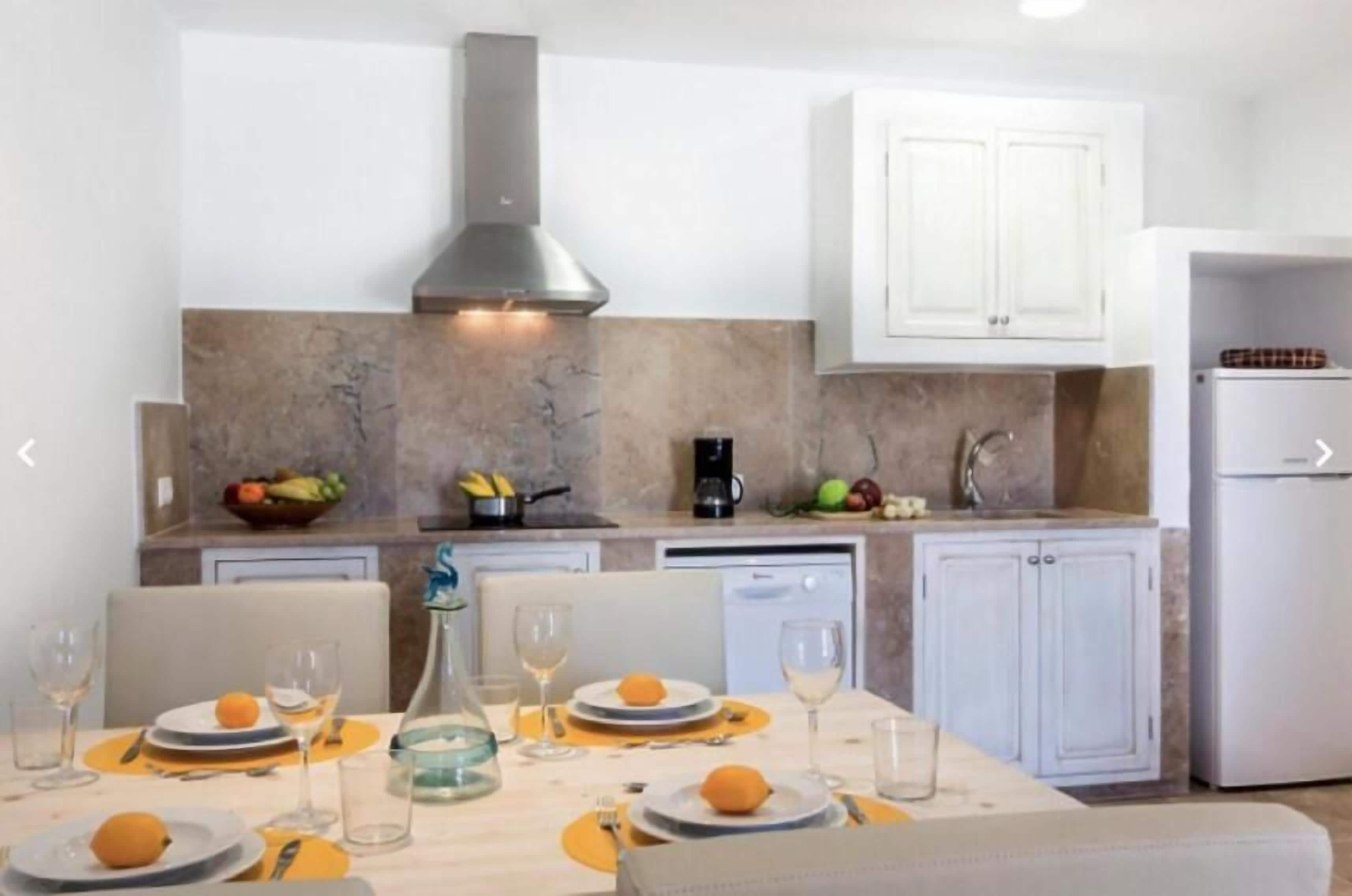 Fridge, microwave, stovetop, cookware/dishes/utensils