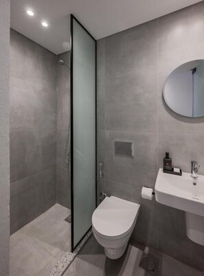 Standard Studio, City View | Bathroom - Livingville East (New Cairo)