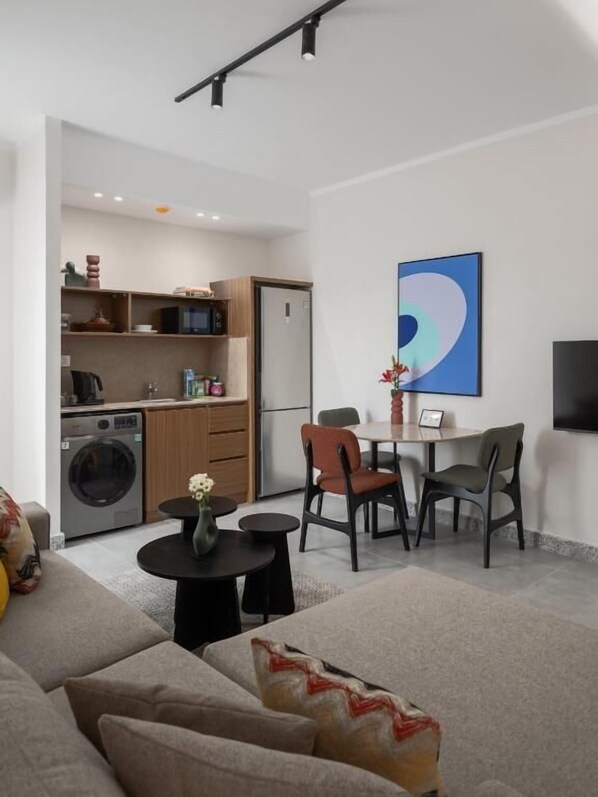 Family Apartment, Balcony, City View | Living area - Livingville East (New Cairo)