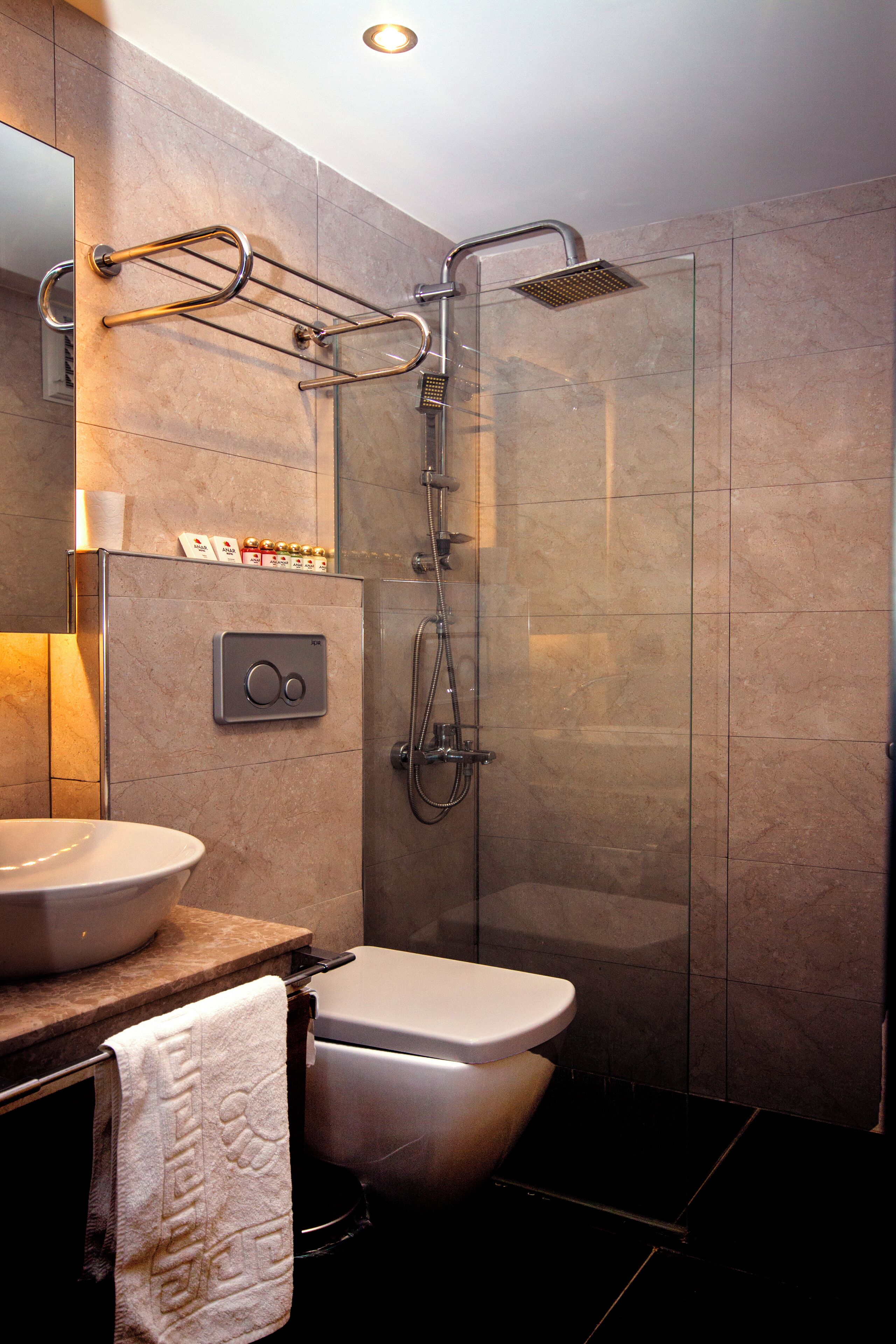 Shower, hair dryer, slippers, towels