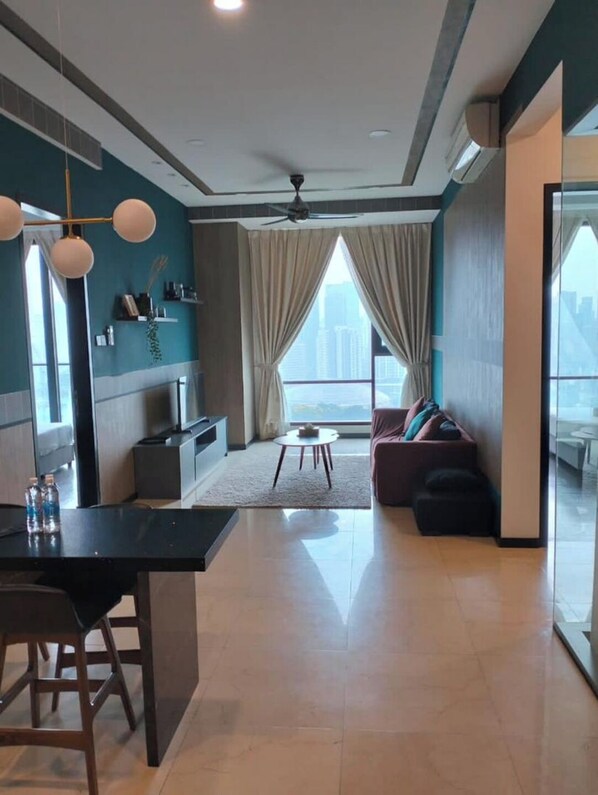 Suite Familiale, 2 chambres | Coin séjour