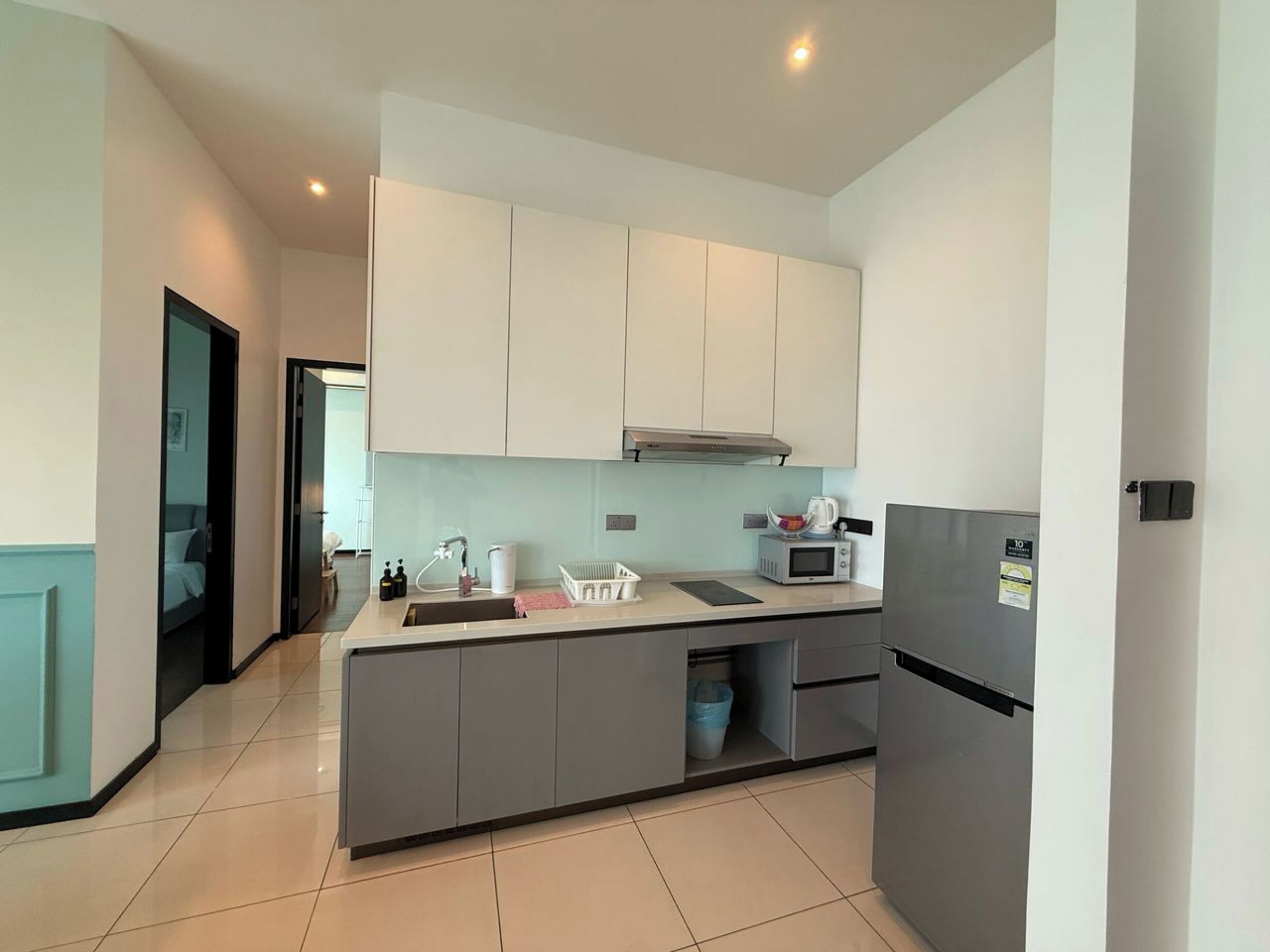 Suite familiar, 2 habitaciones | Cocina privada | Frigorífico, microondas, lavavajillas y mesa de comedor