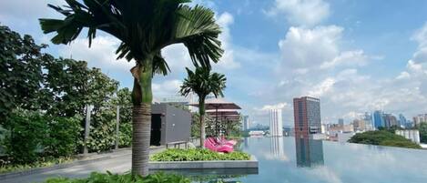 2 indoor pools, open 7:00 AM to 10:00 PM, pool umbrellas, pool loungers