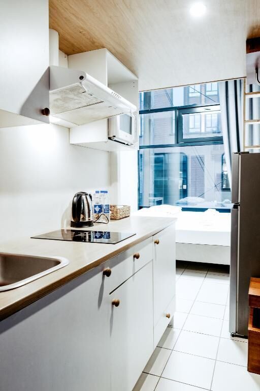 Comfort Apartment, City View | Private kitchen | Fridge, microwave, stovetop, cookware/dishes/utensils