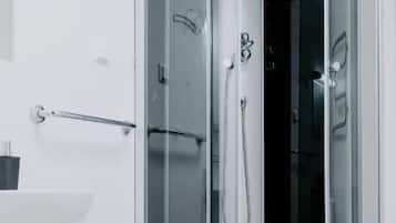 Comfort Apartment | Bathroom | Shower, free toiletries, towels, soap