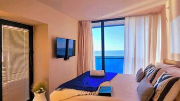 Deluxe Suite | Egyptian cotton sheets, premium bedding, desk, blackout curtains