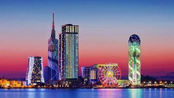 On the beach, black sand