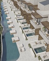 Una piscina al aire libre, tumbonas