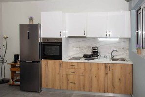 Refrigerador, horno, parrilla de estufa y tostadora 
