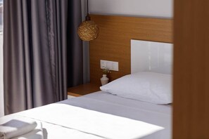 Coffres-forts dans les chambres, fer et planche à repasser, Wi-Fi