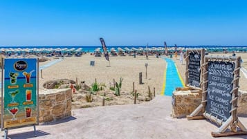 Sur la plage, serviettes de plage