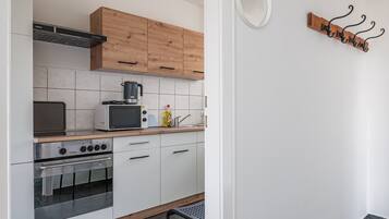 Microwave, stovetop, electric kettle, toaster