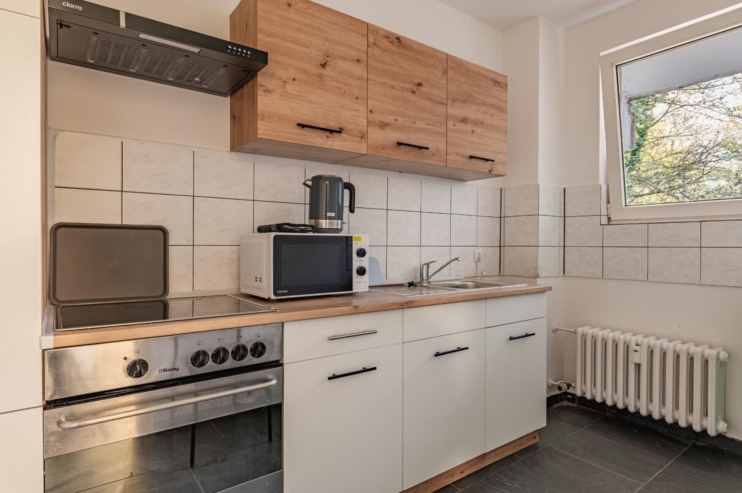 Microwave, stovetop, electric kettle, toaster