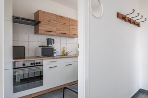 Micro-ondas, cooktop, chaleira elétrica, torradeira