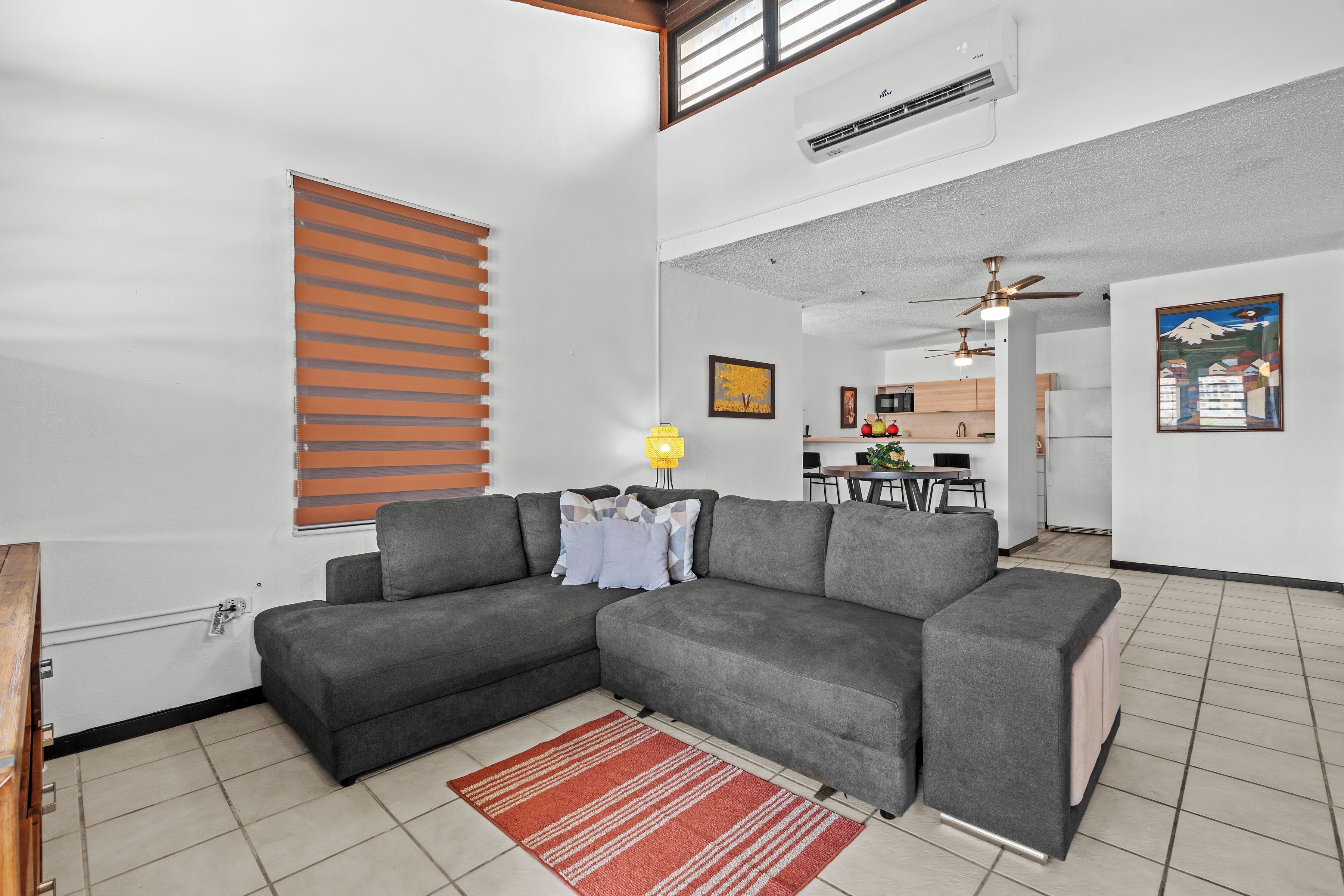 Deluxe Apartment, Balcony | Living area | 32-inch flat-screen TV with digital channels