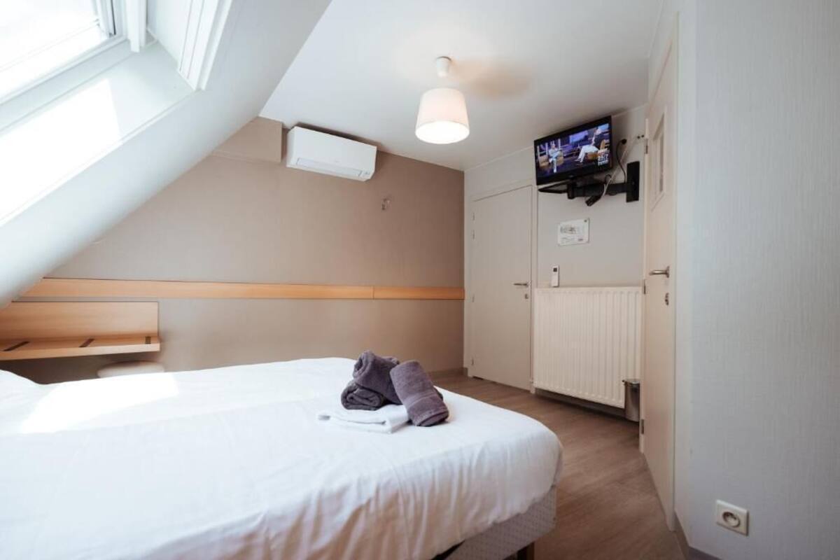 Desk, laptop workspace, blackout curtains, free WiFi