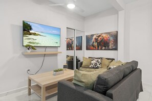 Family Apartment | Living area | 32-inch flat-screen TV with digital channels - Manati by Otium (Manatí)