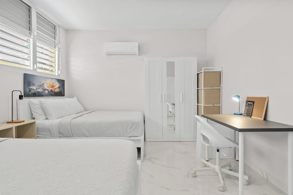 Apartamento família | Escrivaninha, Wi-Fi de cortesia