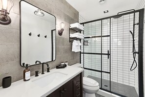 Shower, hair dryer, towels, soap - Stylish Industrial 1BR Above DT Collingwood Bakery (Collingwood)