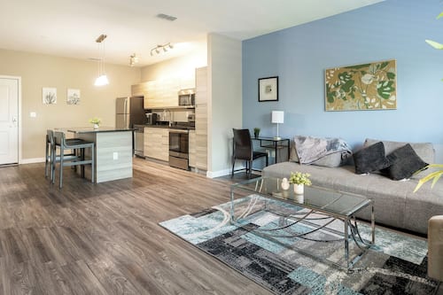 Apartment (1 Bedroom) | Living area | 50-inch Smart TV with digital channels