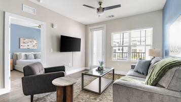 Apartment (1 Bedroom) | Living area | 50-inch TV with digital channels