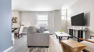 Apartment (1 Bedroom) | Living area | 50-inch Smart TV with digital channels