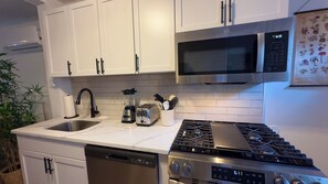 Microwave, oven, stovetop, dishwasher - Stylish Fishtown 2BR/2BA + Office + Bonus TV Lounge + Private Patio – 30+ Days (Philadelphia)