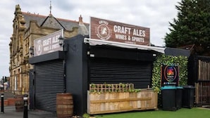 A building with a sign for 'Craft Ales Wines & Spirits'. - The residency rooms liverpool  (Liverpool)