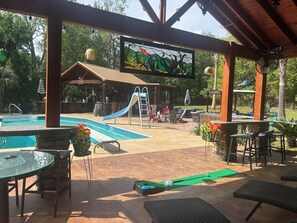 Outdoor pool - 3600 sq ft. Backyard oasis!hot tub, pool,outdoor kitchen,4 BR 3 baths, plus half (North Augusta)