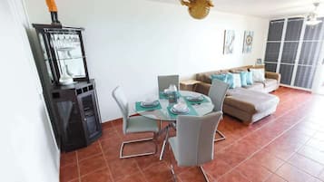 Superior Apartment, Balcony | Living area | 32-inch flat-screen TV with digital channels