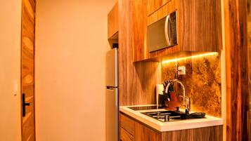 Deluxe Studio, Sea View | Private kitchen | Fridge, microwave, stovetop, cookware/dishes/utensils