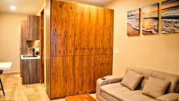 Estudio Deluxe, vista al mar | Área de sala de estar