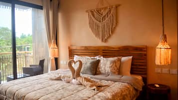 Appartement Deluxe, vue mer | Coffres-forts dans les chambres, fer et planche Ă repasser